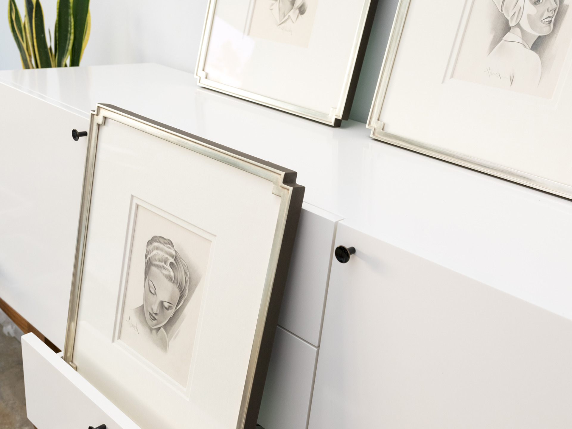 Vintage lady sketches framed in gold notched corner frames
