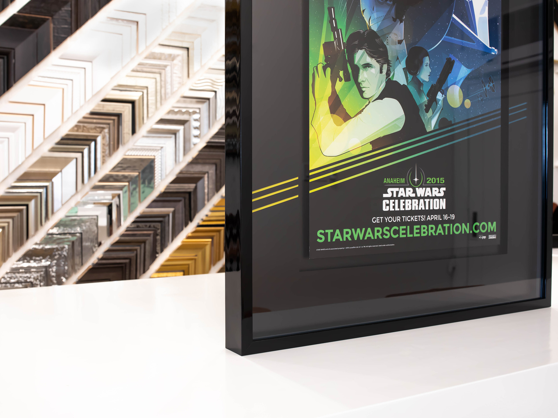 Details of black lacquer custom frame and specialty mat cuts for a Disney Star Wars celebration poster.